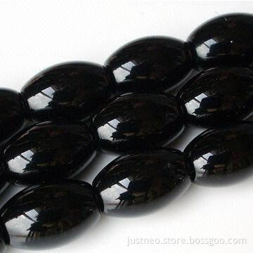 Black polished barrel-shaped semi precious agate gemstone, beaded strand
